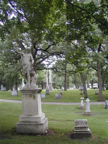 gravestones with statues